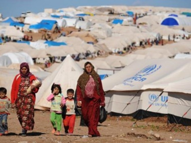 Генсек ООН Пан Ги Мун призвал разделить бремя приема беженцев в Европе  - ảnh 1